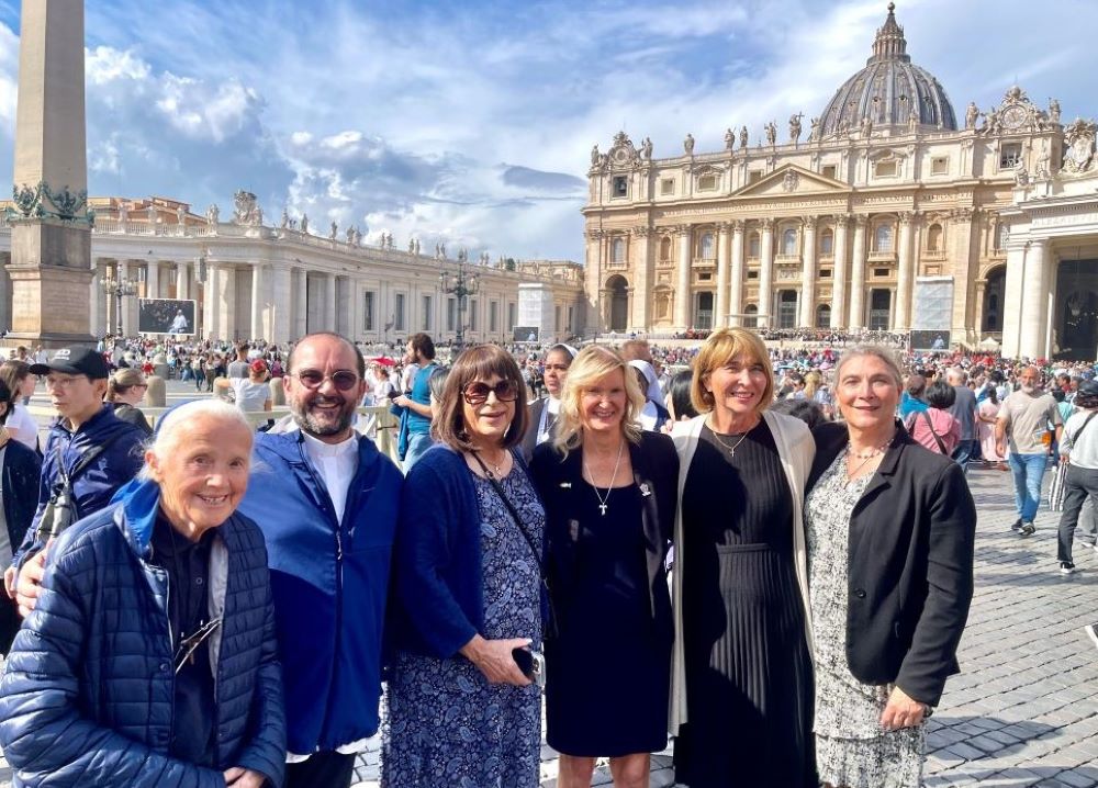 Martha Marvel, Christine Zuba, Maureen Rasmussen and Lynn Discenza pose in St. Peter's Square at the Vatican with Fr. Andrea Conocchia and Sr. Geneviève Jeanningros, on Sept. 18. Martha Marvel, Christine Zuba, Maureen Rasmussen and Lynn Discenza pose in St. Peter's Square at the Vatican with Fr. Andrea Conocchia and Sr. Geneviève Jeanningros, on Sept. 18.